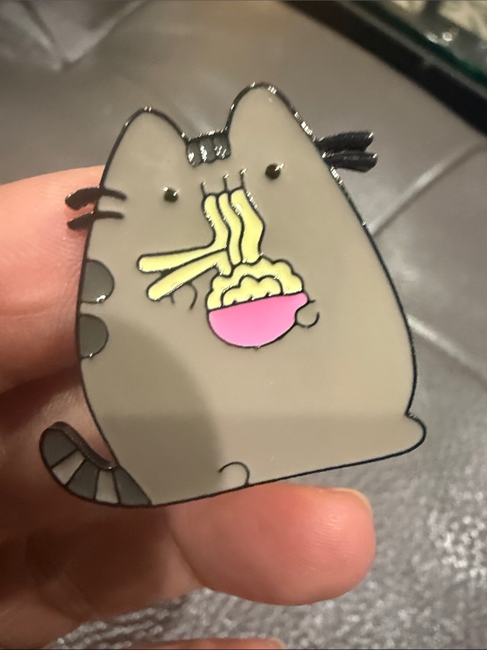 Gray Pusheen Cat Enamel Pin with Pink Bowl and Yellow Noodles